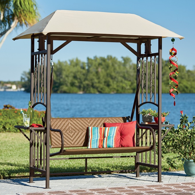 Wicker swing with outlet canopy
