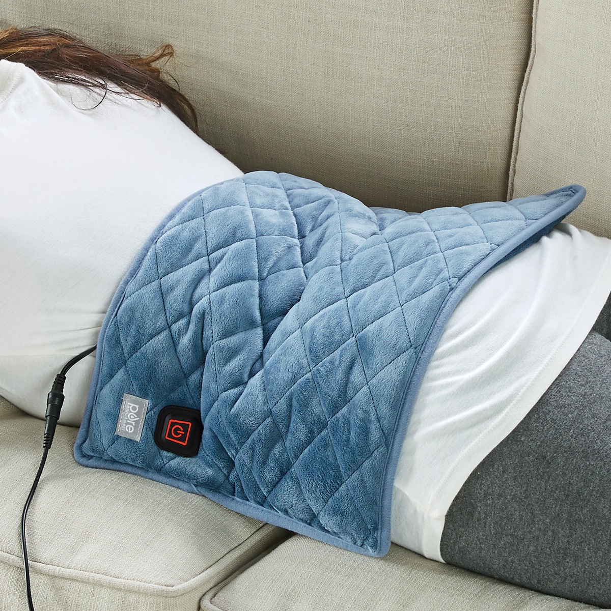 Weighted heated pad clearance